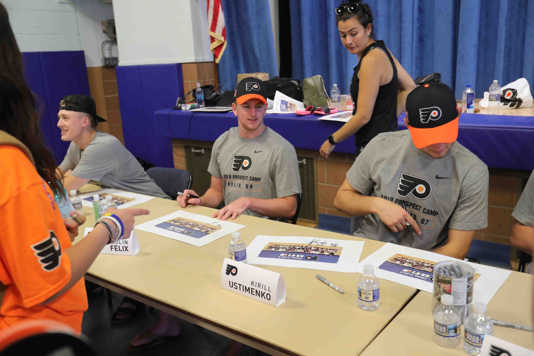 Philadelphia Flyers prospects sign autographs and play volleyball